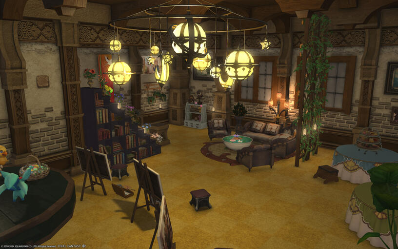 Final Fantasy 14 screenshot: Small house basement, a few easels, painting materials and a big bookshelf with many colourful flower pots on the right. Cosy seating area with a pond-like table in the right. Chandelier with planets.